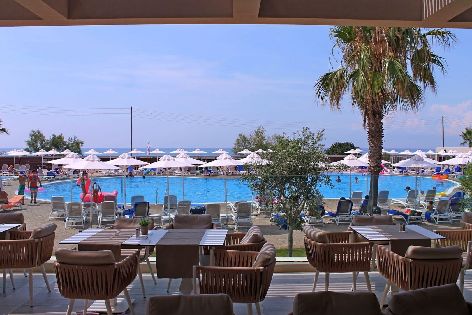 Almyros Beach Almiros Beach Bagian luar foto A pool at a hotel in Crete, Greece