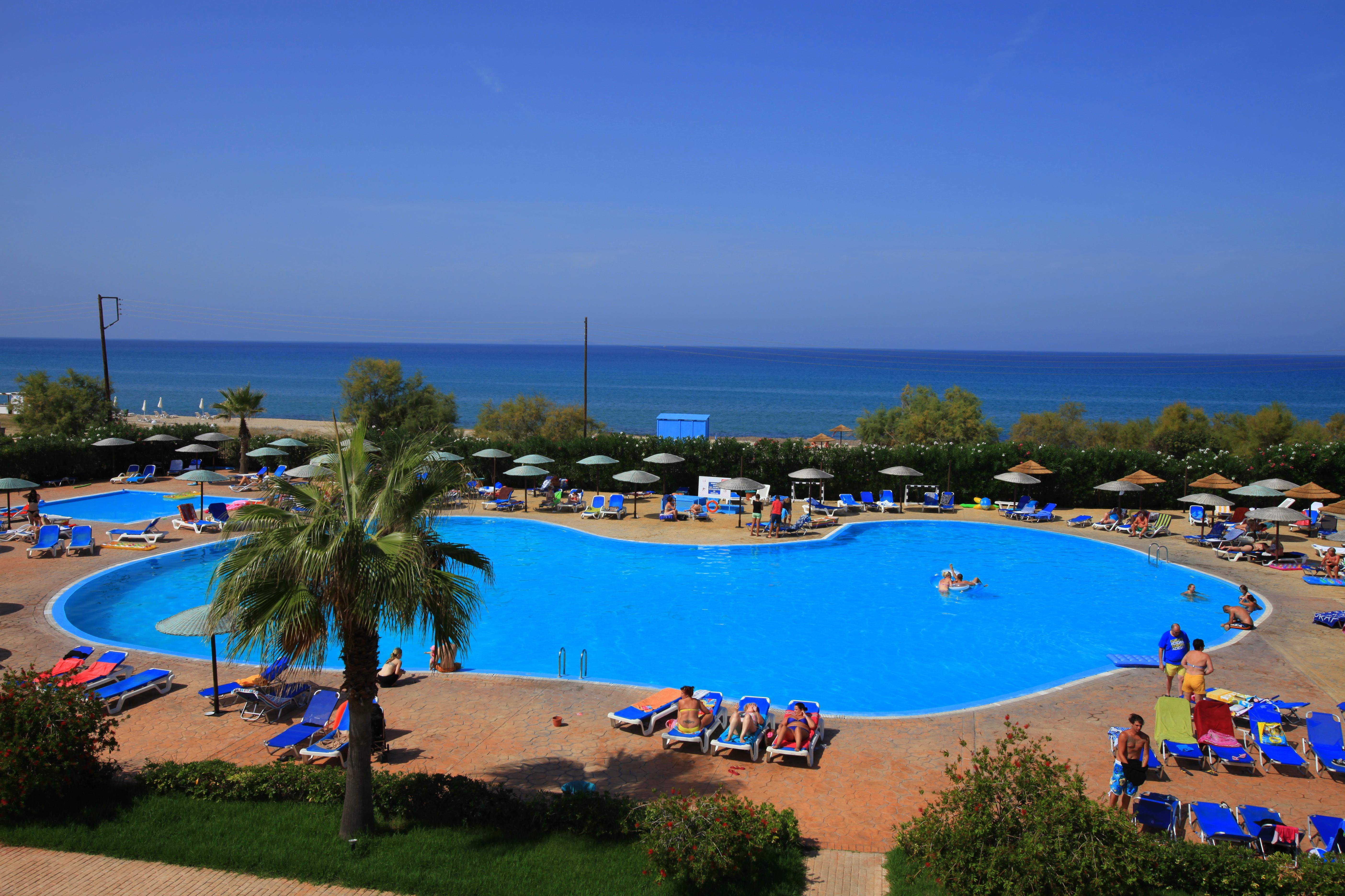 Almyros Beach Almiros Beach Bagian luar foto A swimming pool in Greece