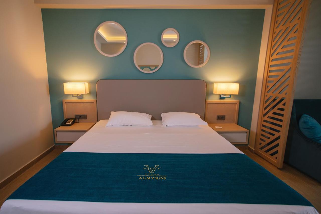 Almyros Beach Almiros Beach Bagian luar foto A bedroom at the hotel