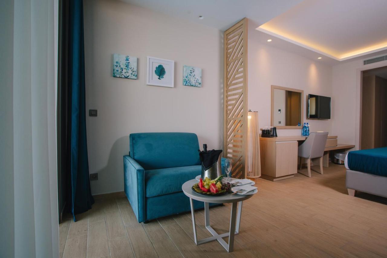 Almyros Beach Almiros Beach Bagian luar foto A room at the hotel