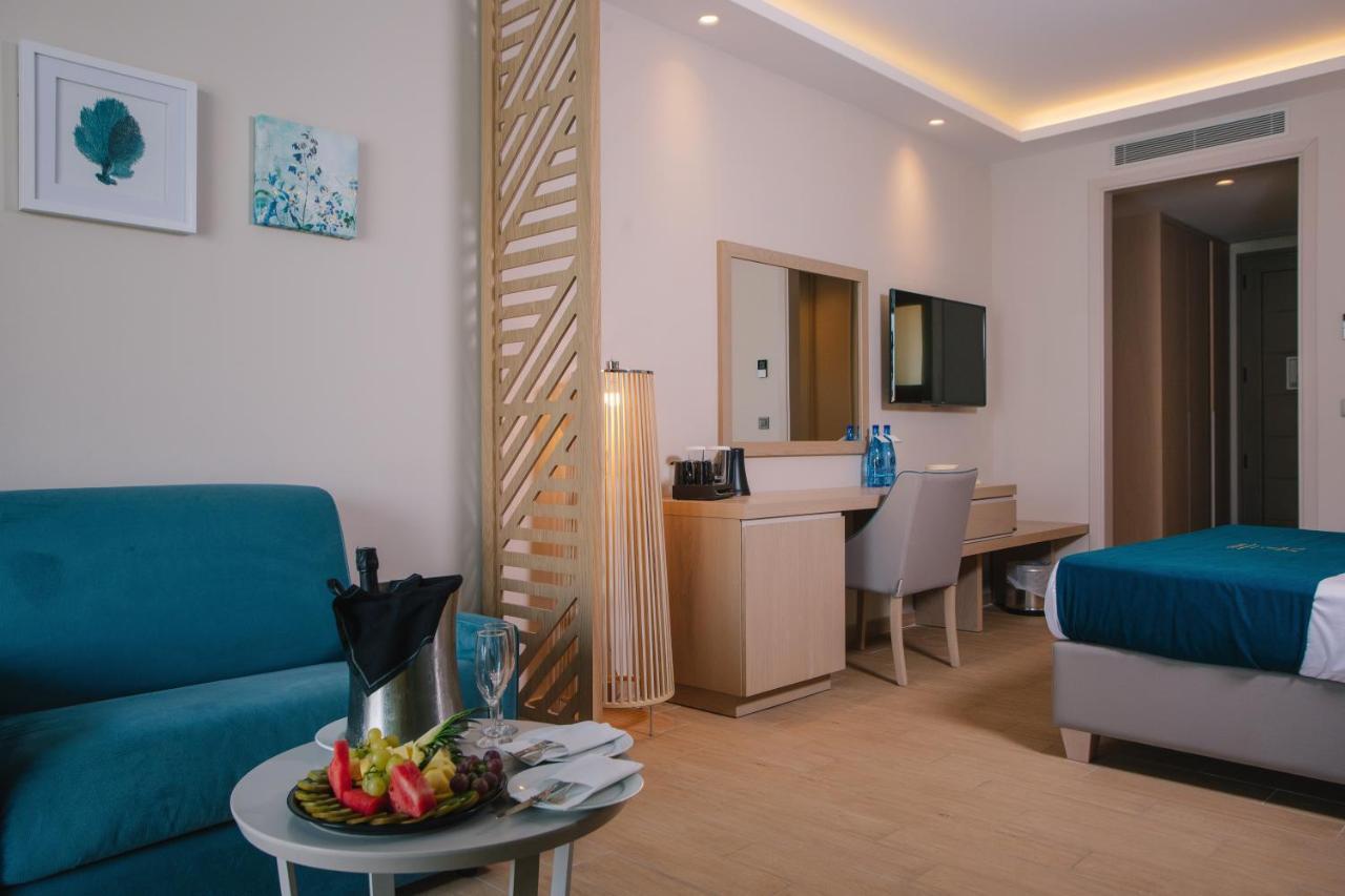 Almyros Beach Almiros Beach Bagian luar foto A room at the hotel
