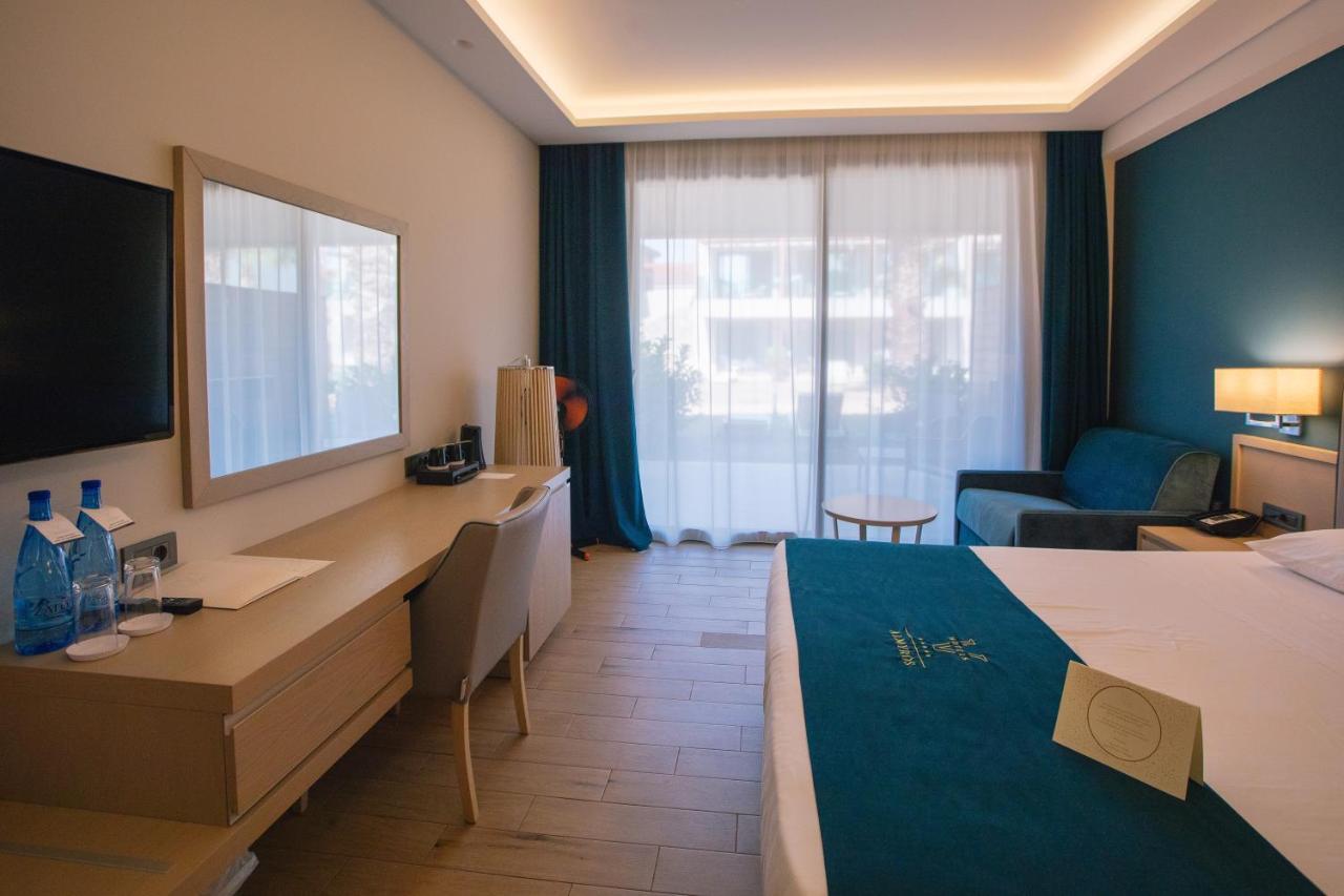 Almyros Beach Almiros Beach Bagian luar foto A room at the hotel