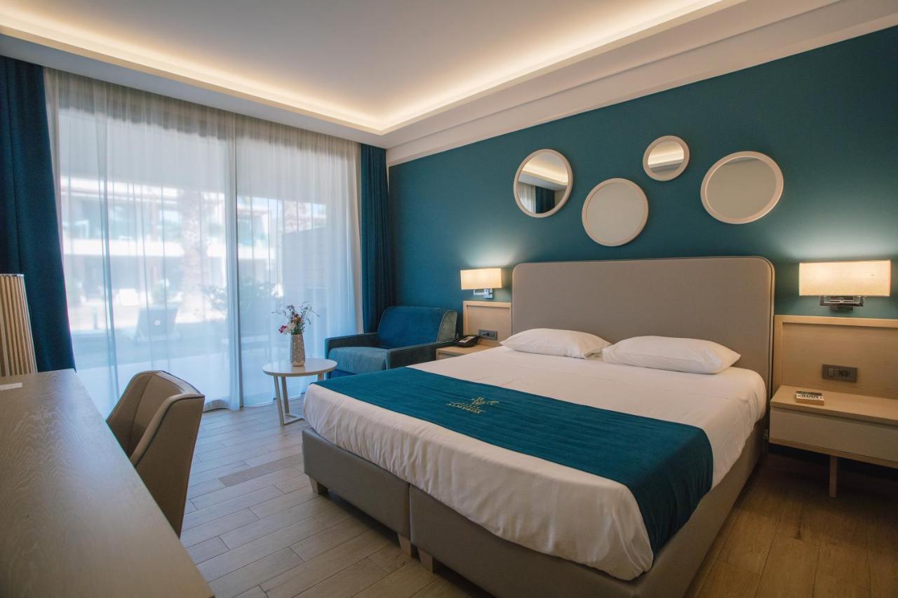 Almyros Beach Almiros Beach Bagian luar foto A room at the hotel