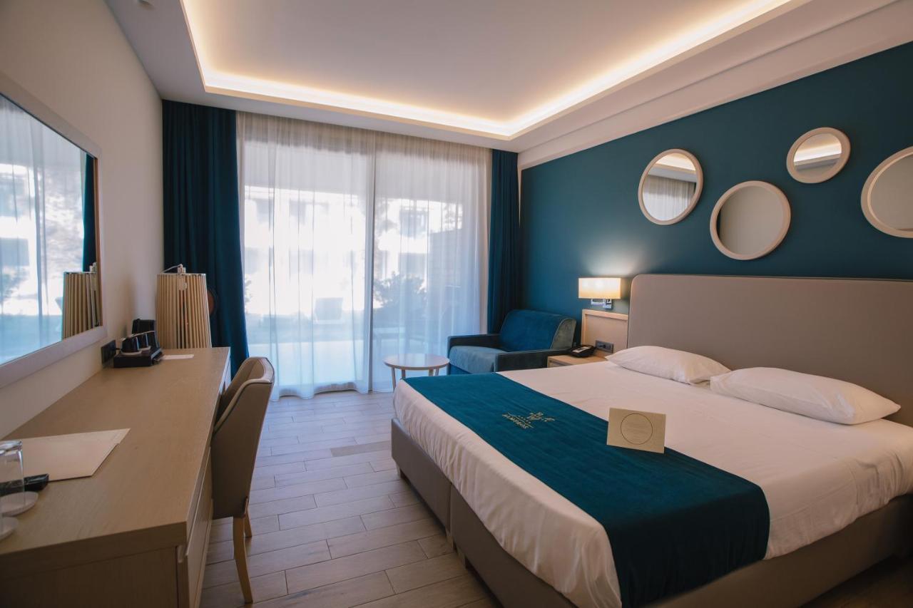 Almyros Beach Almiros Beach Bagian luar foto A room at the hotel