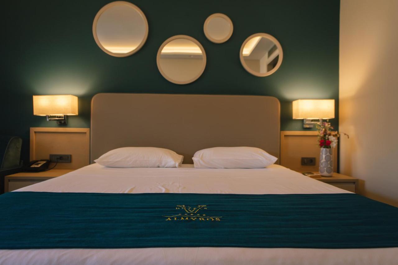 Almyros Beach Almiros Beach Bagian luar foto A bedroom at the hotel