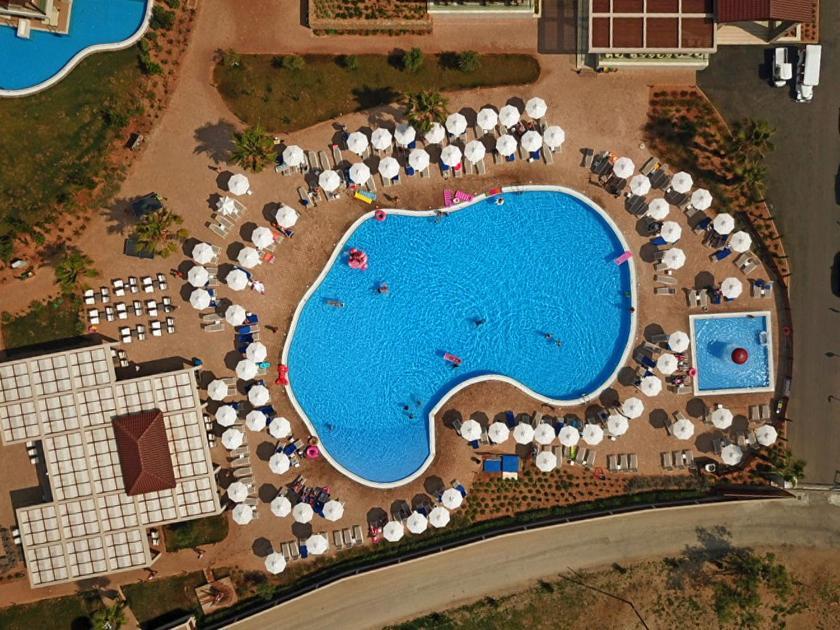 Almyros Beach Almiros Beach Bagian luar foto Aerial view of a swimming pool